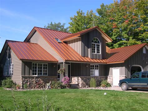 white house with copper metal roof|white standing seam metal roof.